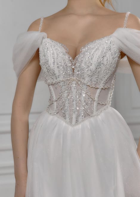 свадебное латье, в котором слились воедино нежность, изящество и сияние – идеальный выбор для вашей волшебной свадьбы!